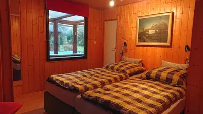Ein Bett oder Betten in einem Zimmer der Unterkunft Ferienhaus Maxen