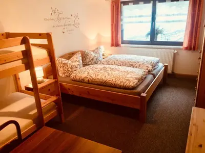 Ein Bett oder Betten in einem Zimmer der Unterkunft Haus am Gründel