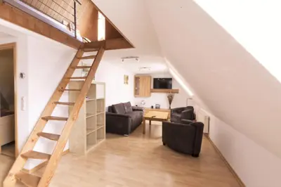 Ein Sitzbereich in der Unterkunft Ferienwohnung Löffler