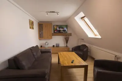 Ein Sitzbereich in der Unterkunft Ferienwohnung Löffler