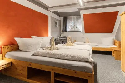 Ein Bett oder Betten in einem Zimmer der Unterkunft Pension Schrammsteinbaude