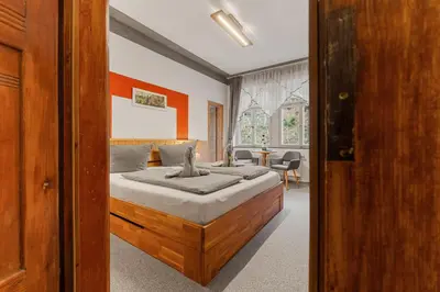 Ein Bett oder Betten in einem Zimmer der Unterkunft Pension Schrammsteinbaude