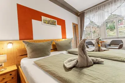 Ein Bett oder Betten in einem Zimmer der Unterkunft Pension Schrammsteinbaude