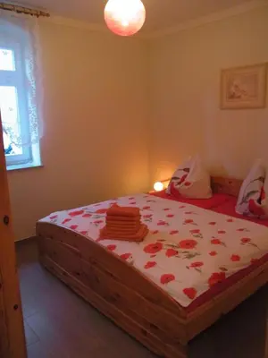 Ein Bett oder Betten in einem Zimmer der Unterkunft Ferienwohnungen 