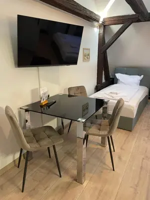 Ein Bett oder Betten in einem Zimmer der Unterkunft Trobischhof