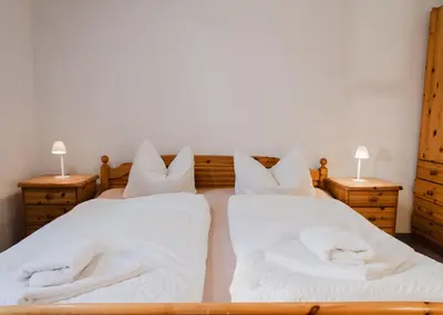 Ein Bett oder Betten in einem Zimmer der Unterkunft Trobischhof