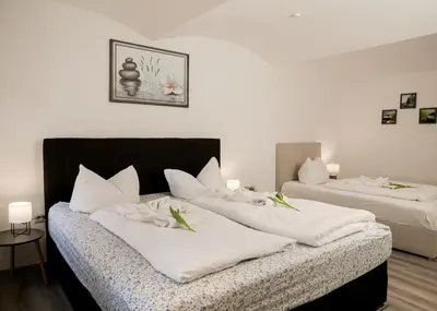 Ein Bett oder Betten in einem Zimmer der Unterkunft Trobischhof