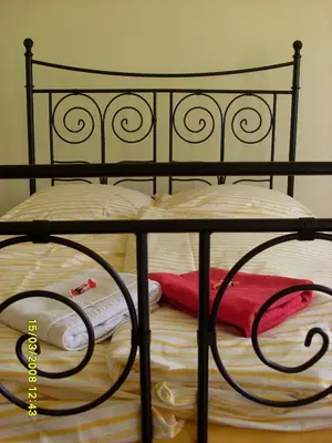 Ein Bett oder Betten in einem Zimmer der Unterkunft Pension Behnisch