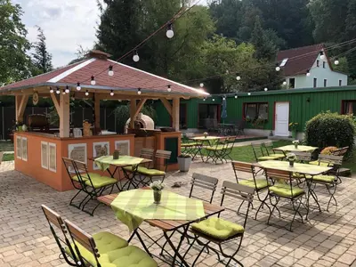 Ein Restaurant oder anderes Speiselokal in der Unterkunft Ferienwohnung Schwemmer