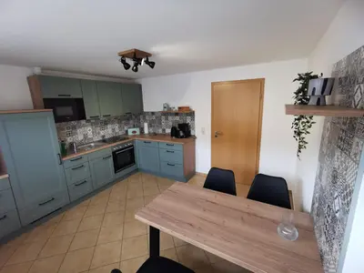 Küche/Küchenzeile in der Unterkunft Ferienhof Gräfe - 3-Seiten Hof mit großem Garten, Pool & Sauna