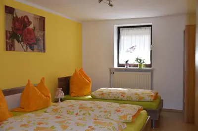 Ein Bett oder Betten in einem Zimmer der Unterkunft Ferienwohnung Bayer