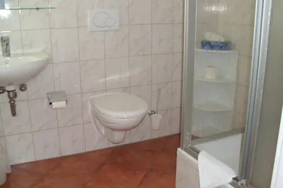 Ein Badezimmer in der Unterkunft Pension Am Renner