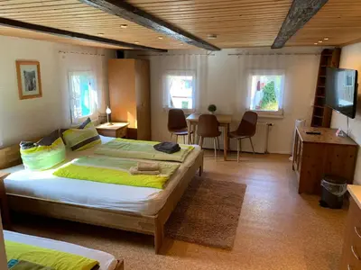 Ein Bett oder Betten in einem Zimmer der Unterkunft Haus Bergfriede