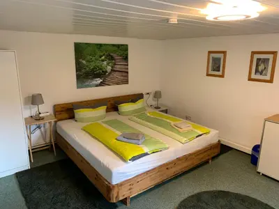 Ein Bett oder Betten in einem Zimmer der Unterkunft Haus Bergfriede