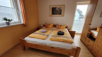 Ein Bett oder Betten in einem Zimmer der Unterkunft Ferienhof Lilienstein