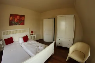 Ein Bett oder Betten in einem Zimmer der Unterkunft Dampfschiff Radebeul-Altkö