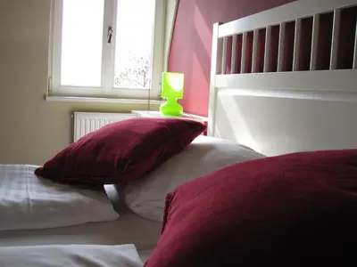 Ein Bett oder Betten in einem Zimmer der Unterkunft Dampfschiff Radebeul-Altkö