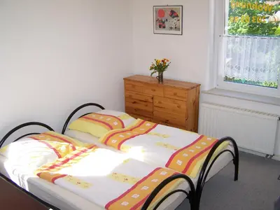 Ein Bett oder Betten in einem Zimmer der Unterkunft Ferienwohnung Ahrendt