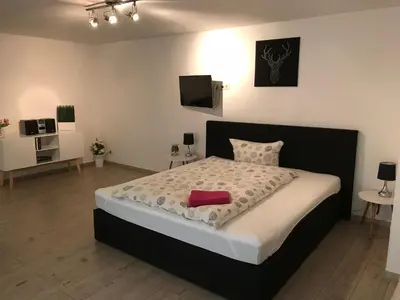 Ein Bett oder Betten in einem Zimmer der Unterkunft Ferienpark Senftenberg