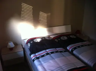 Ein Bett oder Betten in einem Zimmer der Unterkunft Ferienpark Senftenberg