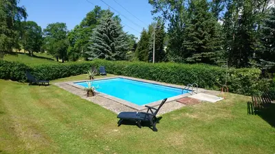 Der Swimmingpool an oder in der Nähe von Ferienwohnung am Erlermuhlenbach