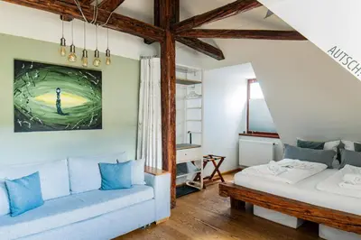 Ein Bett oder Betten in einem Zimmer der Unterkunft Boutique Hotel am Schillerplatz