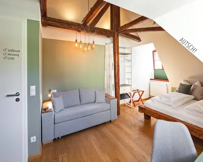 Ein Sitzbereich in der Unterkunft Boutique Hotel am Schillerplatz