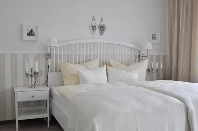 Ein Bett oder Betten in einem Zimmer der Unterkunft Dampfschiffhotel