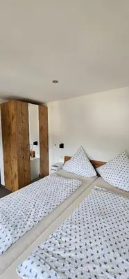 Ein Bett oder Betten in einem Zimmer der Unterkunft Pension 