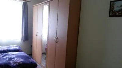 Ein Bett oder Betten in einem Zimmer der Unterkunft Ferienhaus Lilienstein