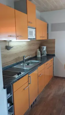 Küche/Küchenzeile in der Unterkunft Ferienwohnung Am Elbradweg