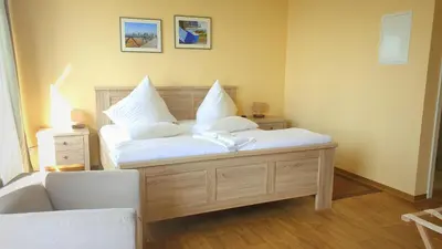 Ein Bett oder Betten in einem Zimmer der Unterkunft Haus Vier