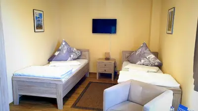 Ein Bett oder Betten in einem Zimmer der Unterkunft Haus Vier