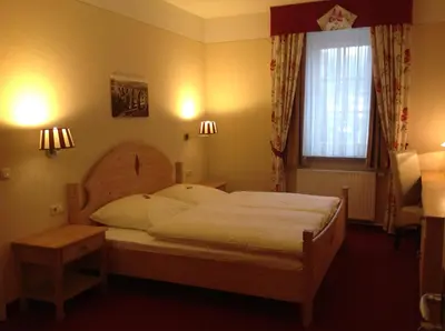 Ein Bett oder Betten in einem Zimmer der Unterkunft bei Zwillings Hotel & Restaurant