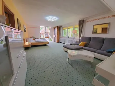 Ein Sitzbereich in der Unterkunft Pension Am Nationalpark