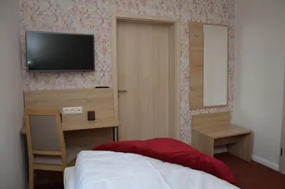 Ein Bett oder Betten in einem Zimmer der Unterkunft Pension Kalinde