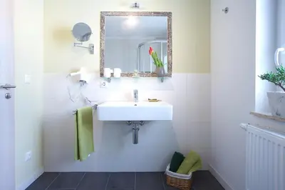 Ein Badezimmer in der Unterkunft Pension Kalinde