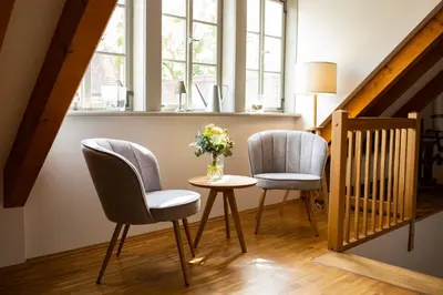 Ein Sitzbereich in der Unterkunft Weingut Haus Steinbach