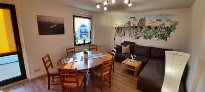 Ein Sitzbereich in der Unterkunft Ferienhaus und Ferienwohnung Büttner