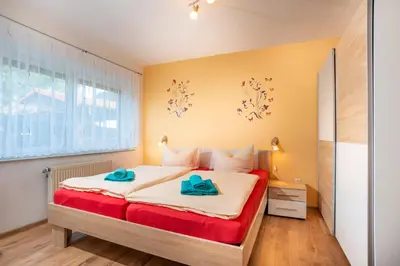 Ein Bett oder Betten in einem Zimmer der Unterkunft Pension Am Weinberg Sächsische Schweiz