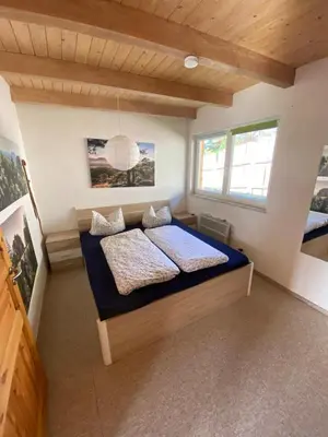 Ein Bett oder Betten in einem Zimmer der Unterkunft Ferienhaus 