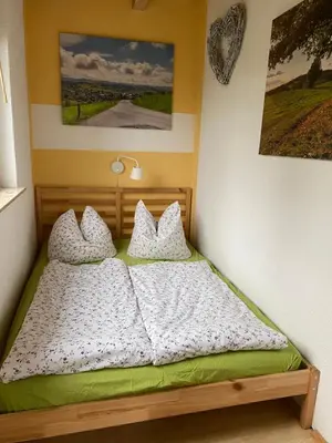 Ein Bett oder Betten in einem Zimmer der Unterkunft Ferienhaus 