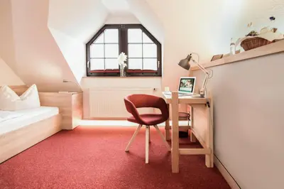 Ein Bett oder Betten in einem Zimmer der Unterkunft Hotel & Restaurant Waldblick