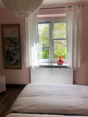 Ein Bett oder Betten in einem Zimmer der Unterkunft Wohlfühloase Dresden Nickern