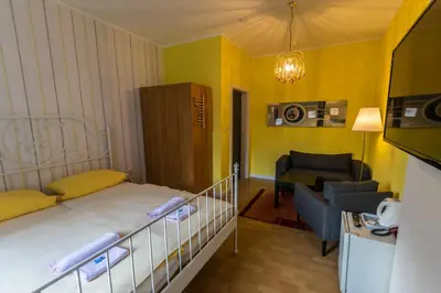 Ein Bett oder Betten in einem Zimmer der Unterkunft Pension Menge