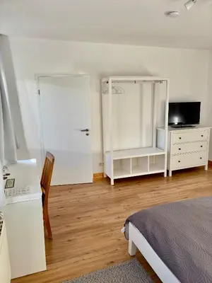 Ein Bett oder Betten in einem Zimmer der Unterkunft Kornkäfer Kleinmockritz
