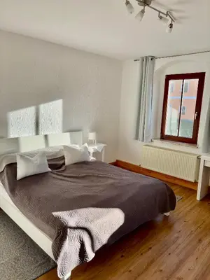 Ein Bett oder Betten in einem Zimmer der Unterkunft Kornkäfer Kleinmockritz