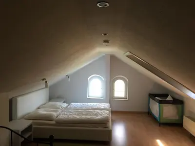 Ein Bett oder Betten in einem Zimmer der Unterkunft Ferienwohnung Tonberg 4