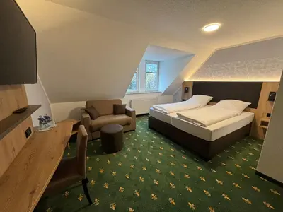 Ein Bett oder Betten in einem Zimmer der Unterkunft Hotel Gasthof zur Heinzebank