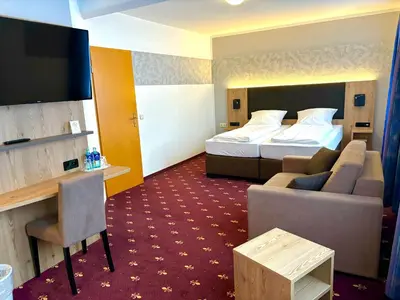 Ein Bett oder Betten in einem Zimmer der Unterkunft Hotel Gasthof zur Heinzebank